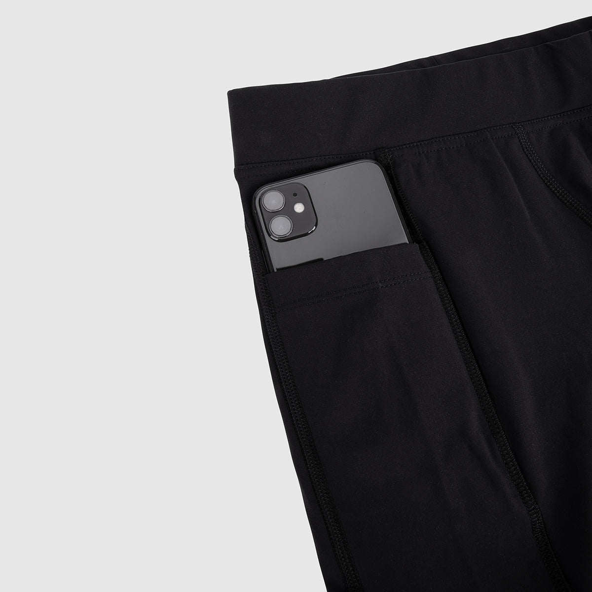 Kurze Lauftights Damen, schwarz, mit Tasche