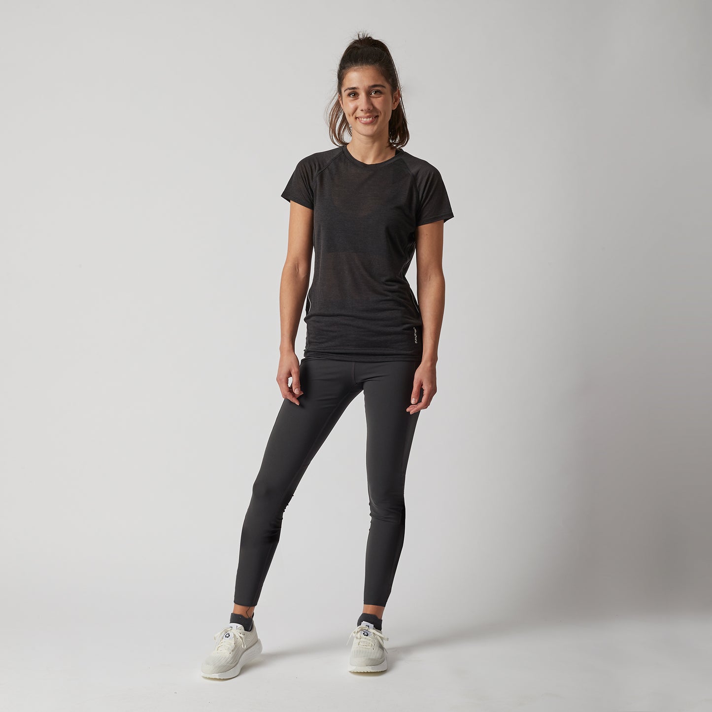 Lange Lauftights Damen, schwarz, mit Tasche