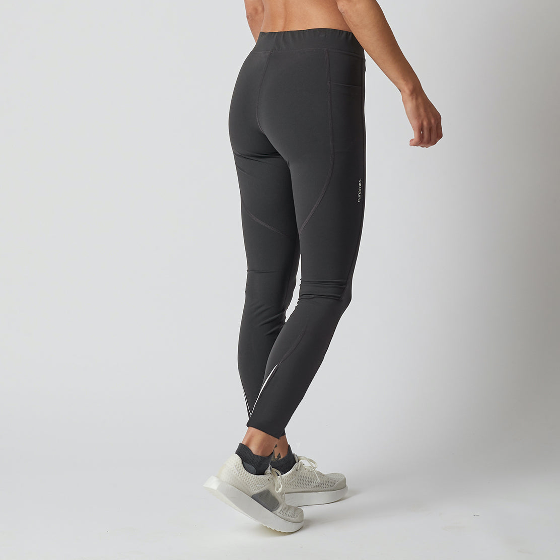 Lange Lauftights Damen, schwarz, mit Tasche